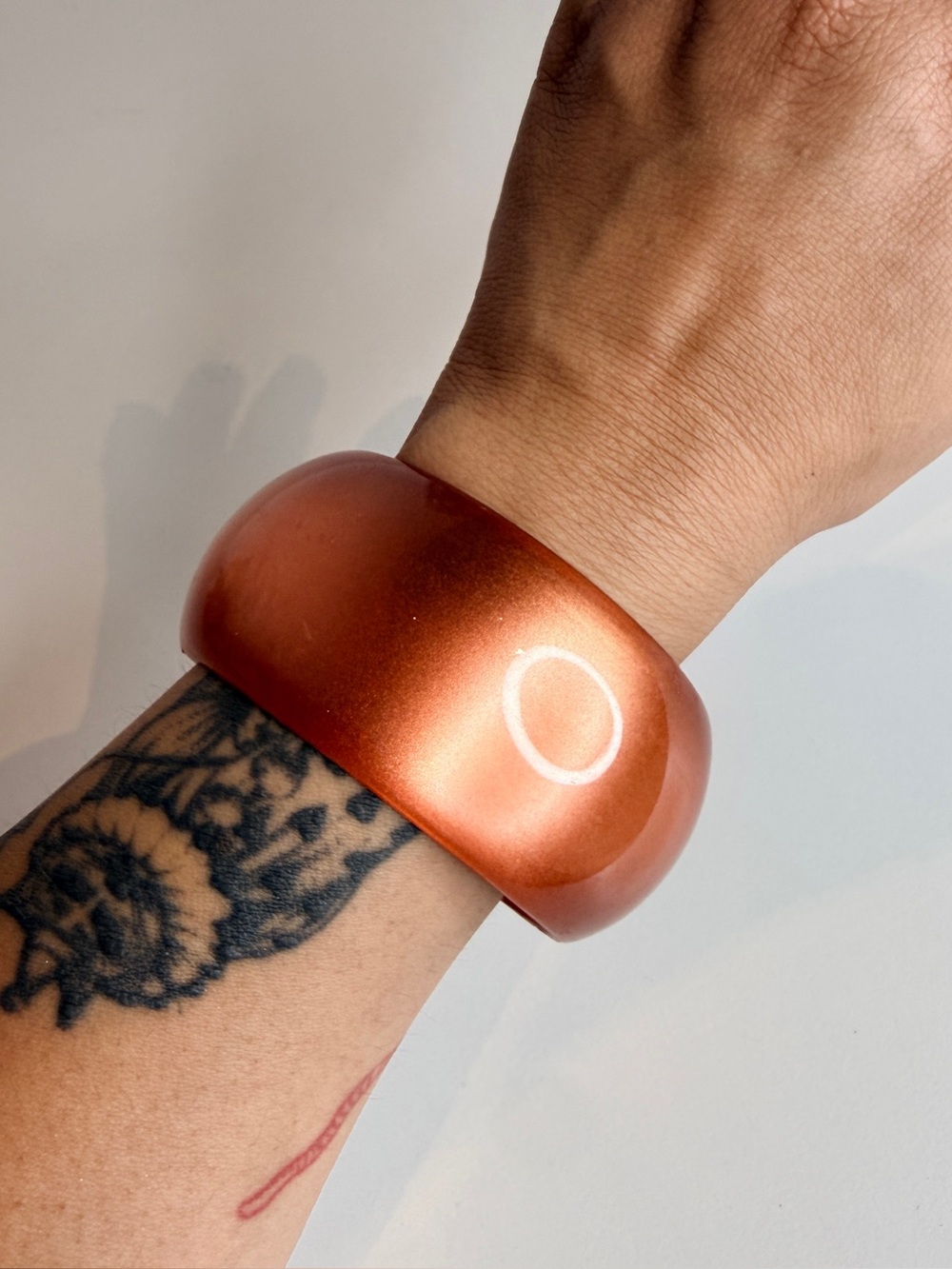 Orange moon glow bangle